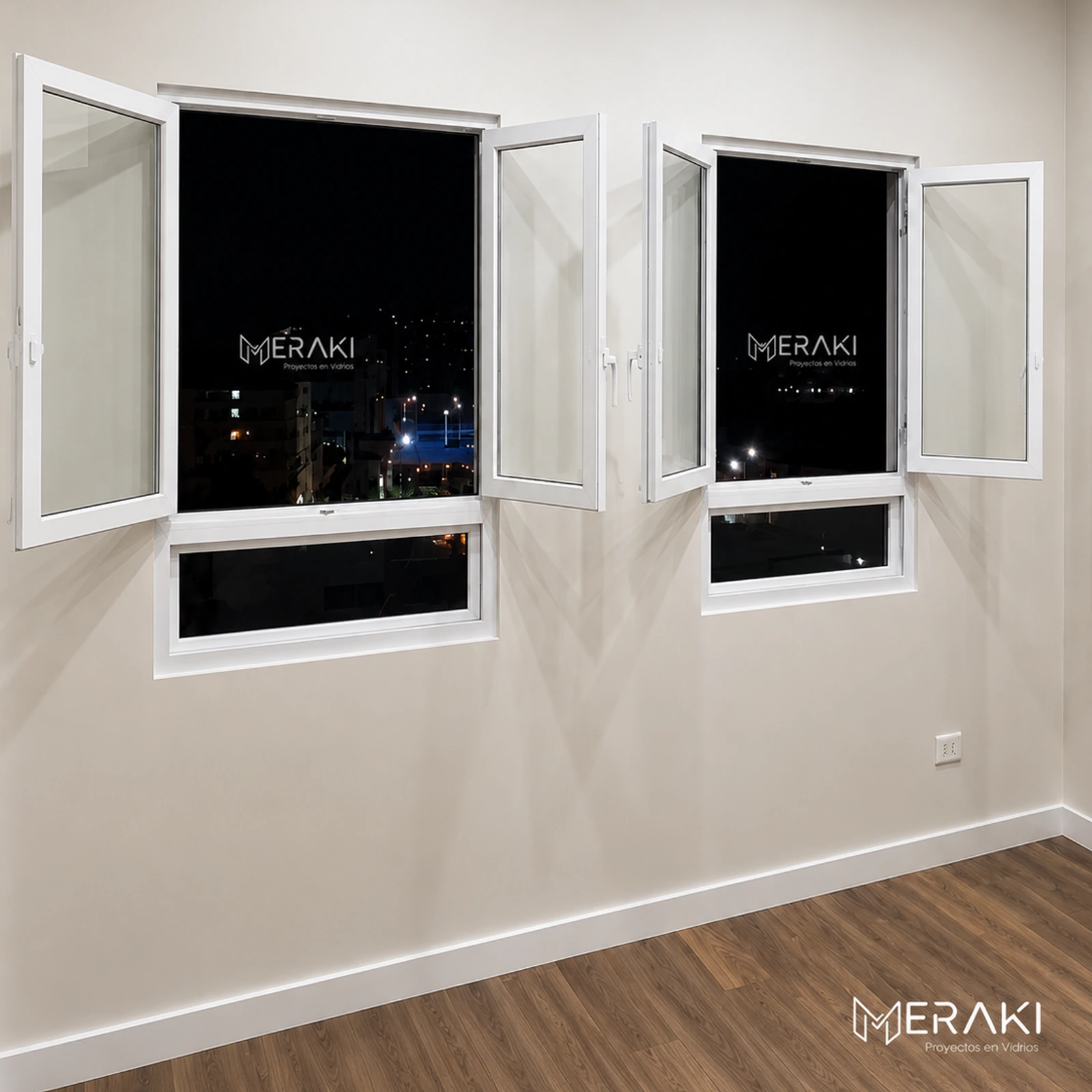 Dos ventanas batientes de aluminio blanco abiertas en una habitación